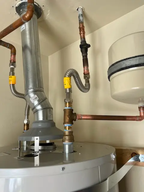 Water heater installation and plumbing repair in Friendship Station